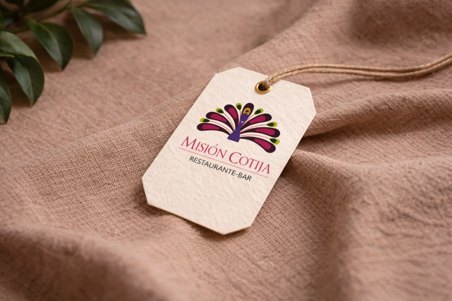 A Misión Cotija hang tag resting on linen